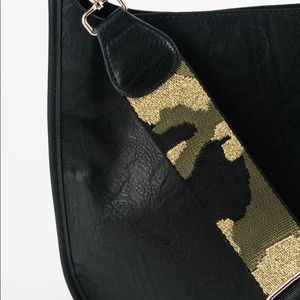 Vegan leather crossbody bag with camo guitar strap